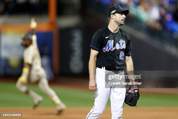 Max Scherzer of the New York Mets reacts after giving up a three-run home run to Jurickson Profar of the San Diego Padres during the fifth inning of...