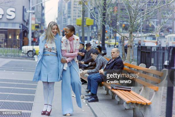Toukie Smith with a model in Digit's fall collection. Shot on location in Herald's Square Park, New York.
