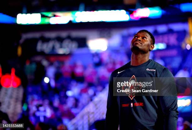Zion Williamson of the New Orleans Pelicans stands on the court prior to the start of an NBA preseason game against the Detroit Pistons at Smoothie...