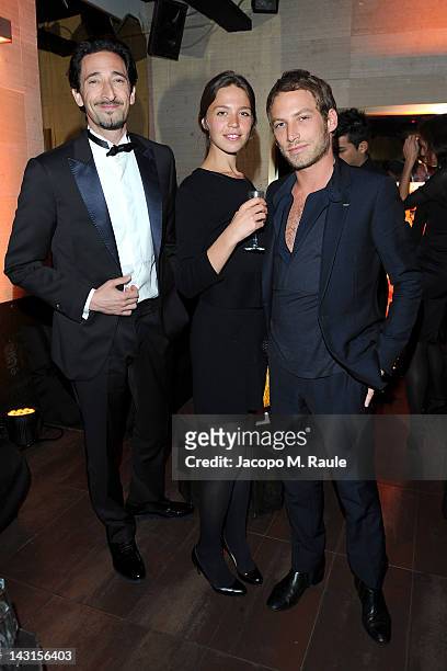 Actor Adrien Brody , guest and designer Ora Ito attend the "Royal Oak 40 Years: From Avant-Garde to Icon" party at the Old Fashion Cafe on April 19,...