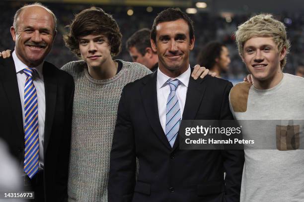 Former rugby league players Wally Lewis and Andrew Johns pose for a photo with Harry Styles and Niall Horan of One Direction during the ANZAC Test...