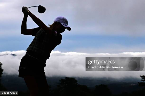 Kumiko Kaneda of Japan hits her tee shot on the 8th hole during the rest of the first round of the Stanley Ladies Honda Golf Tournament at Tomei...