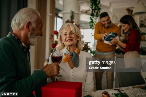 you keep suprising me after all there years - old man woman christmas stock pictures, royalty-free photos & images