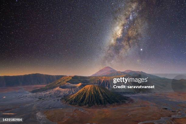 the milky way above bromo mountain - mt bromo stock pictures, royalty-free photos & images