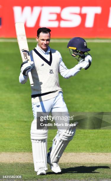 Peter Handscomb of the Bushrangers celebrates bringing up his century during the Sheffield Shield match between South Australia and Victoria at Karen...