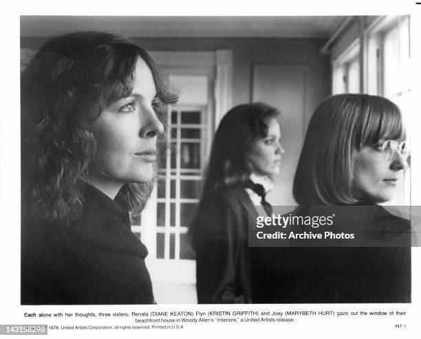 Diane Keaton and Kristin Griffith gaze out the window in a scene from the film 'Interiors', 1978.