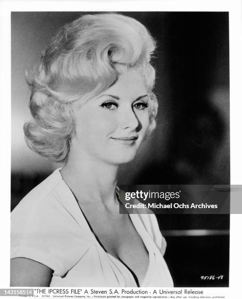 Barbara Roscoe plays the role of Rita, a shapely blonde with a warm smile in a scene from the film 'The Ipcress File', 1965.