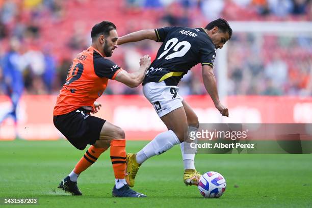 Daniel Arzani of Macarthur is fouled by Jack Hingert of the Roar during the round one A-League Men's match between the Brisbane Roar and Macarthur FC...