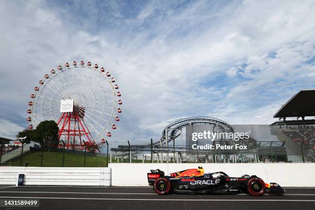 Sergio Perez of Mexico driving the Oracle Red Bull Racing RB18 in the Pitlane during qualifying ahead of the F1 Grand Prix of Japan at Suzuka...