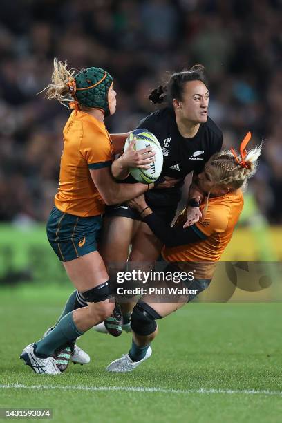 Ruahei Demant of New Zealand is tackled during the Pool A Rugby World Cup 2021 New Zealand match between Australia and New Zealand at Eden Park on...