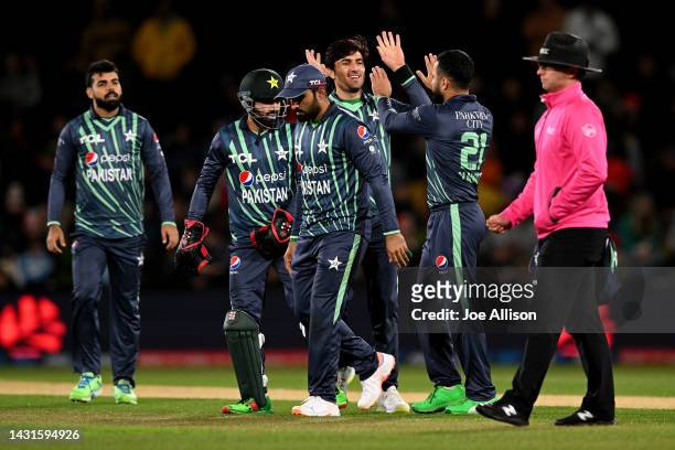 Pakistan celebrate the wicket of Devon Conway with his team during game two of the T20 International series between New Zealand and Pakistan at...