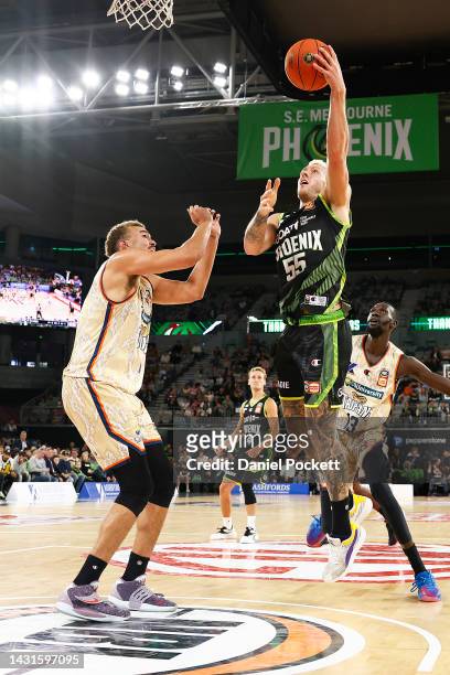 Mitchell Creek of the Phoenix drives to the basket during the round two NBL match between South East Melbourne Phoenix and Cairns Taipans at John...