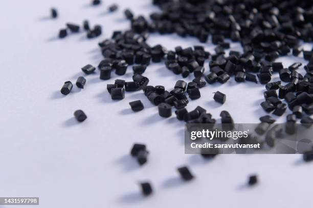 grey chemical granules for industrial plastic production - acetate stock pictures, royalty-free photos & images