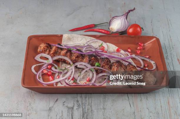 meat barbecue shashlik on gray background - fried turkey stock pictures, royalty-free photos & images