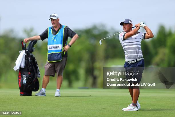 Hideto Tanihara of Torque GC and his caddie are seen on the 18th hole during Day Two of the LIV Golf Invitational - Bangkok at Stonehill Golf Course...