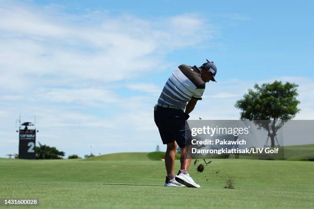 Hideto Tanihara of Torque GC plays an approach shot on the second hole during Day Two of the LIV Golf Invitational - Bangkok at Stonehill Golf Course...