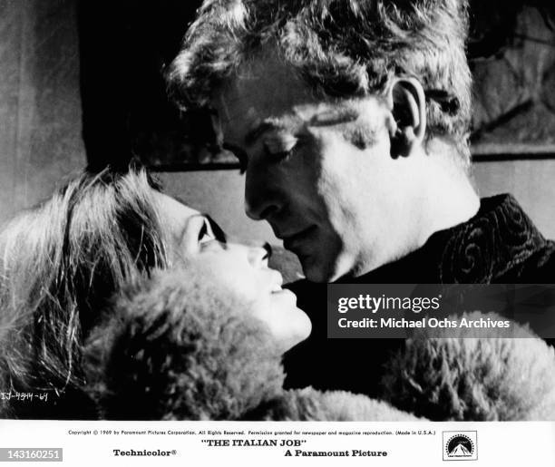 Margaret Blye and Michael Caine looking each other's eyes in a scene from the film 'The Italian Job', 1969.