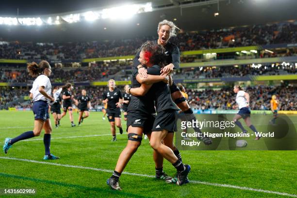 Ruby Tui of New Zealand celebrates with teammates after scoring a try during the Pool A Rugby World Cup 2021 New Zealand match between Australia and...
