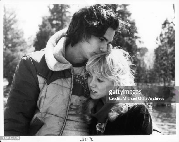 Robby Benson kisses Lynn-Holly Johnson's head in a scene from the film 'Ice Castles', 1978.
