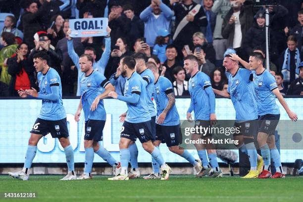Robert Mak of Sydney FC celebrates with team mates after scoring a goal during the round one A-League Men's match between Sydney FC and Melbourne...