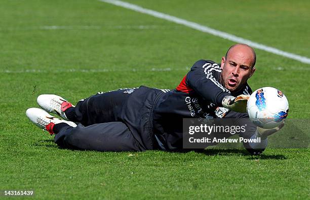 Pepe Reina of Liverpool in action during a training session at Melwood Training Ground on April 20, 2012 in Liverpool, England.