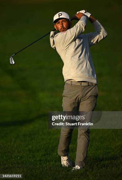 Jack Singh Brar of England plays his approach shot on the first hole during Day Three of the acciona Open de Espana presented by Madrid at Club de...