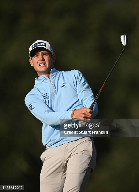 Wilco Nienaber of South Africa plays his approach shot on the firsrt hole during Day Three of the acciona Open de Espana presented by Madrid at Club...