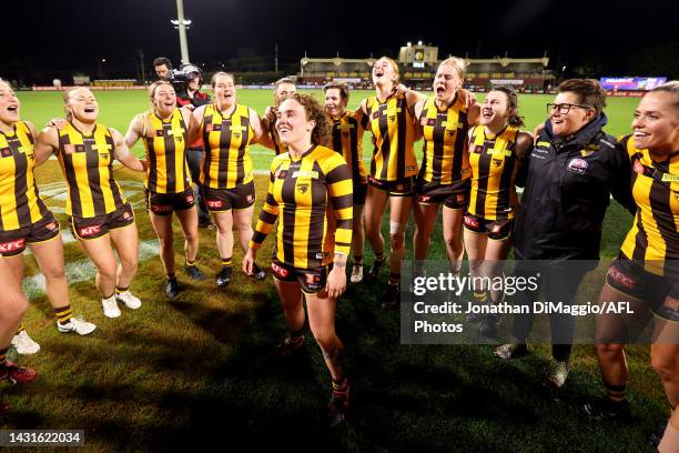 Tilly Lucas-Rodd of the Hawks sings the team song with teammates during the round seven AFLW match between the Hawthorn Hawks and the Port Adelaide...