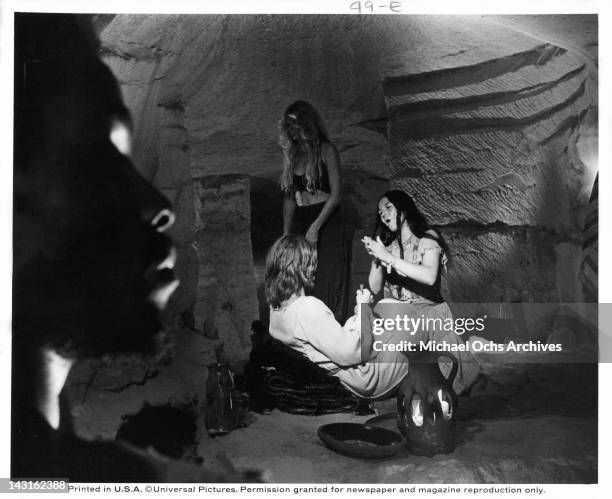 Yvonne Elliman praying to Ted Neeley in a scene from the film 'Jesus Christ Superstar', 1973.