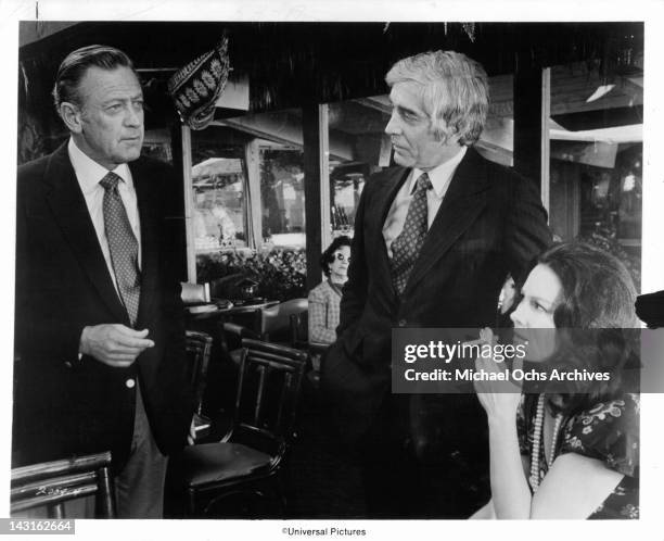 William Holden proceeds to offend Eugene Peterson and Marj Dusay in a scene from the film 'Breezy', 1973.