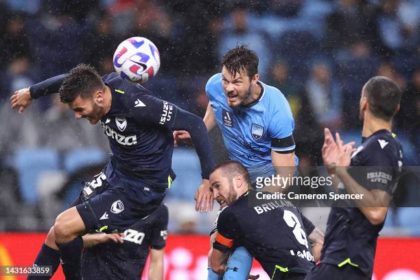 James Donachie of Sydney FC heads the ball to score a goal during the round one A-League Men's match between Sydney FC and Melbourne Victory at...