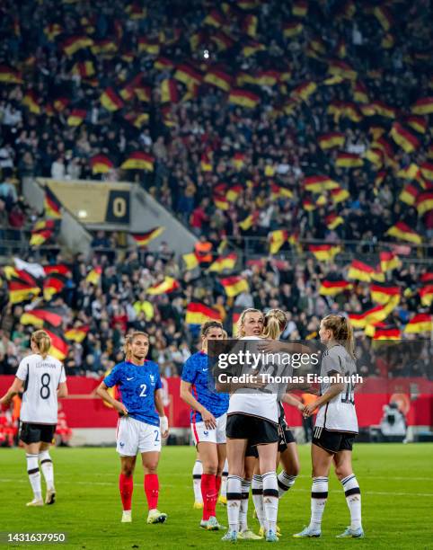 Players of Germany celebrate after the international friendly match between Germany Women's and France Women's at Rudolf-Harbig-Stadion on October...