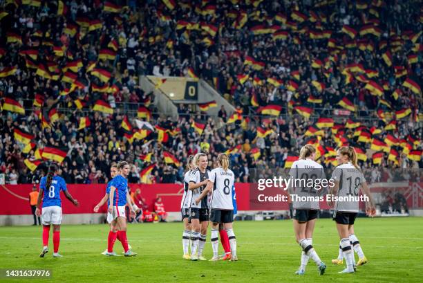 Players of Germany celebrate after the international friendly match between Germany Women's and France Women's at Rudolf-Harbig-Stadion on October...