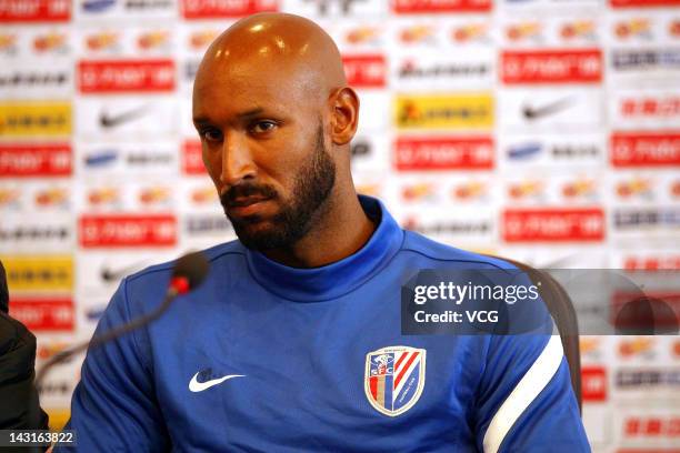 French striker Nicolas Anelka of Shanghai Shenhua speaks during a press conference after a training session at Jinzhou Stadium on April 20, 2012 in...