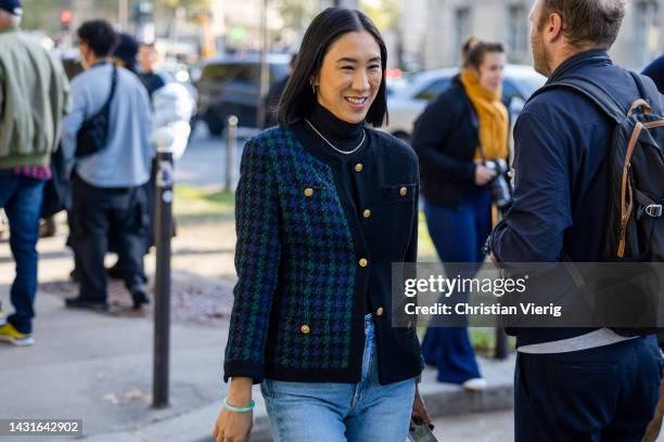 Eva Chen wears blazer, denim jeans outside Chanel during Paris Fashion Week - Womenswear Spring/Summer 2023 : Day Nine on October 04, 2022 in Paris,...