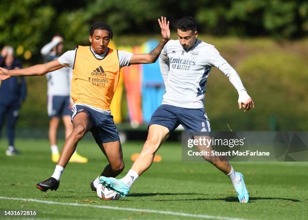 Bradley Ibrahim and Gabriel Martinelli of Arsenal during a training session at London Colney on October 08, 2022 in St Albans, England.