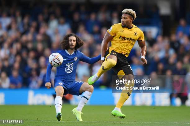 Adama Traore of Wolverhampton Wanderers controls the ball whilst under pressure from Marc Cucurella of Chelsea during the Premier League match...