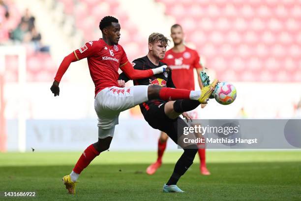 Edimilson Fernandes of 1.FSV Mainz 05 challenges Timo Werner of RB Leipzig during the Bundesliga match between 1. FSV Mainz 05 and RB Leipzig at MEWA...