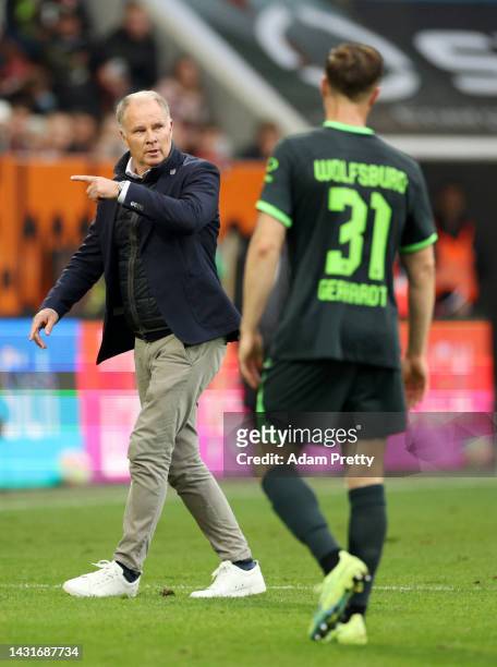 Stefan Reuter, Sporting director of Augsburg gestures to the referee during the Bundesliga match between FC Augsburg and VfL Wolfsburg at WWK-Arena...