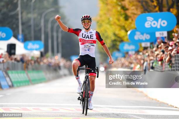 Tadej Pogacar of Slovenia and UAE Team Emirates celebrates at finish line as race winner during the 116th Il Lombardia 2022 a 253km one day race from...