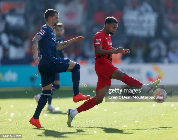 Djibril Sow of Eintracht Frankfurt controls the ball whilst under pressure from Simon Zoller of VfL Bochum during the Bundesliga match between VfL...