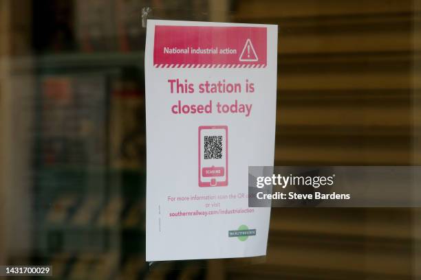 Sign with information regarding the railway industrial strike action is seen prior to the Premier League match between Brighton & Hove Albion and...