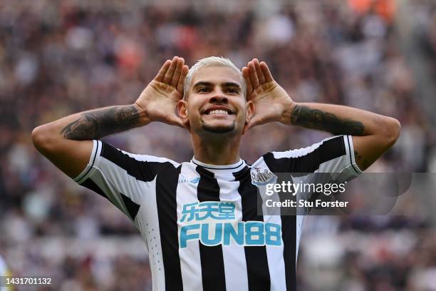 Bruno Guimaraes of Newcastle United celebrates after scoring their team's third goal during the Premier League match between Newcastle United and...