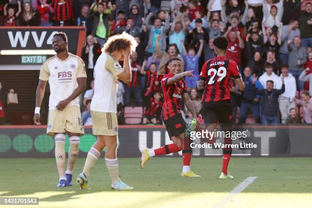 Philip Billing of AFC Bournemouth celebrates with teammate Marcus Tavernier after scoring their team's first goal during the Premier League match...
