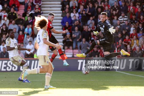 Ryan Christie of AFC Bournemouth scores their team's second goal past Danny Ward of Leicester City during the Premier League match between AFC...