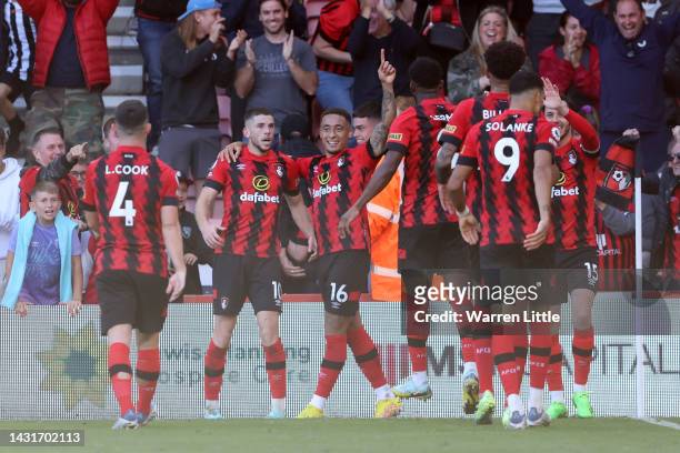 Ryan Christie of AFC Bournemouth celebrates with Marcus Tavernier and teammates after scoring their team's second goal during the Premier League...