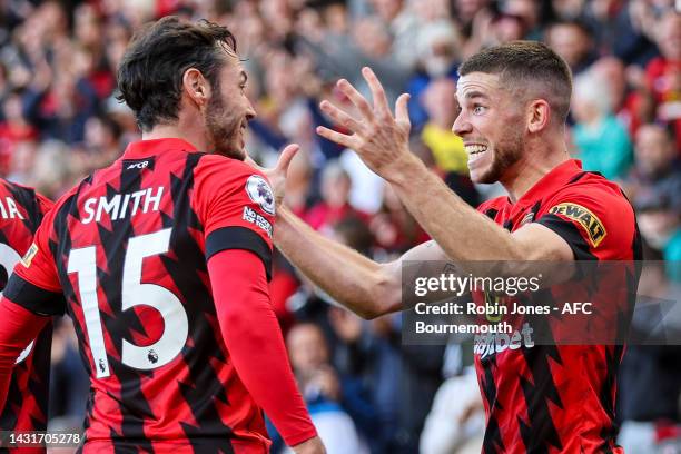 Ryan Christie of Bournemouth is congratulated by team-mates after he scores a goal to make it 2-1 during the Premier League match between AFC...