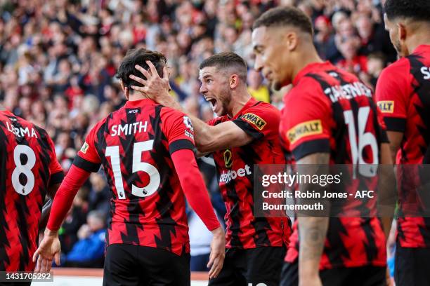 Ryan Christie of Bournemouth is congratulated by team-mates after he scores a goal to make it 2-1 during the Premier League match between AFC...