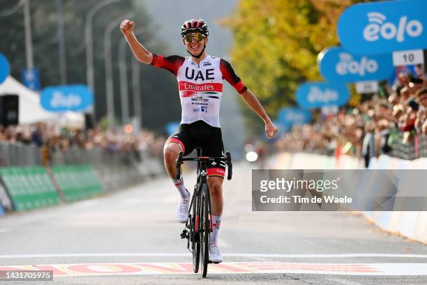 Tadej Pogacar of Slovenia and UAE Team Emirates celebrates at finish line as race winner during the 116th Il Lombardia 2022 a 253km one day race from...