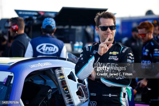 Landon Cassill, driver of the Voyager: Crypto for All Chevrolet, looks on during qualifying for the NASCAR Xfinity Series Drive for the Cure 250...